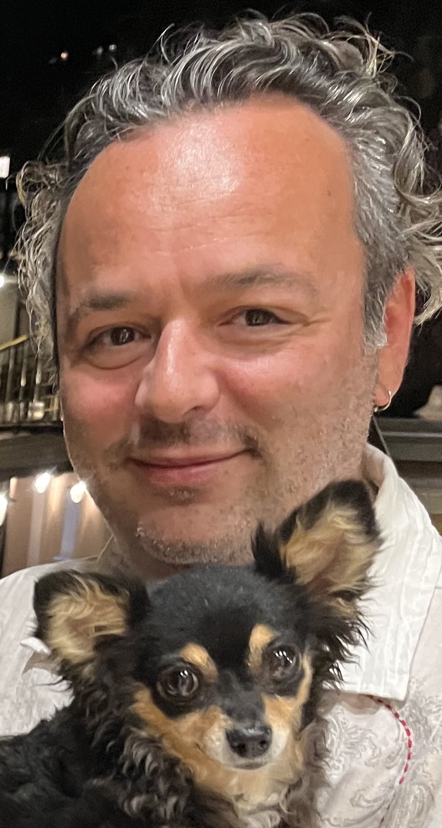 Picture of a guy with a cute dog